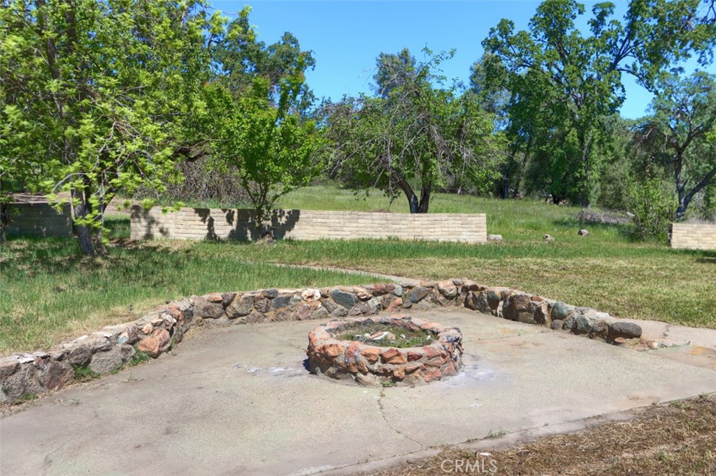 4949 Indian Peak Road Mariposa, CA 95338 - Photo 39 of 56 a view of a backyard with a garden