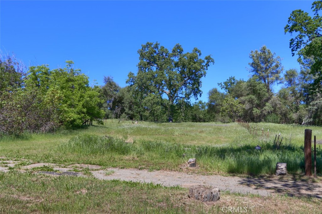 4949 Indian Peak Road Mariposa, CA 95338 - Photo 41 of 56 a view of a lake with a yard