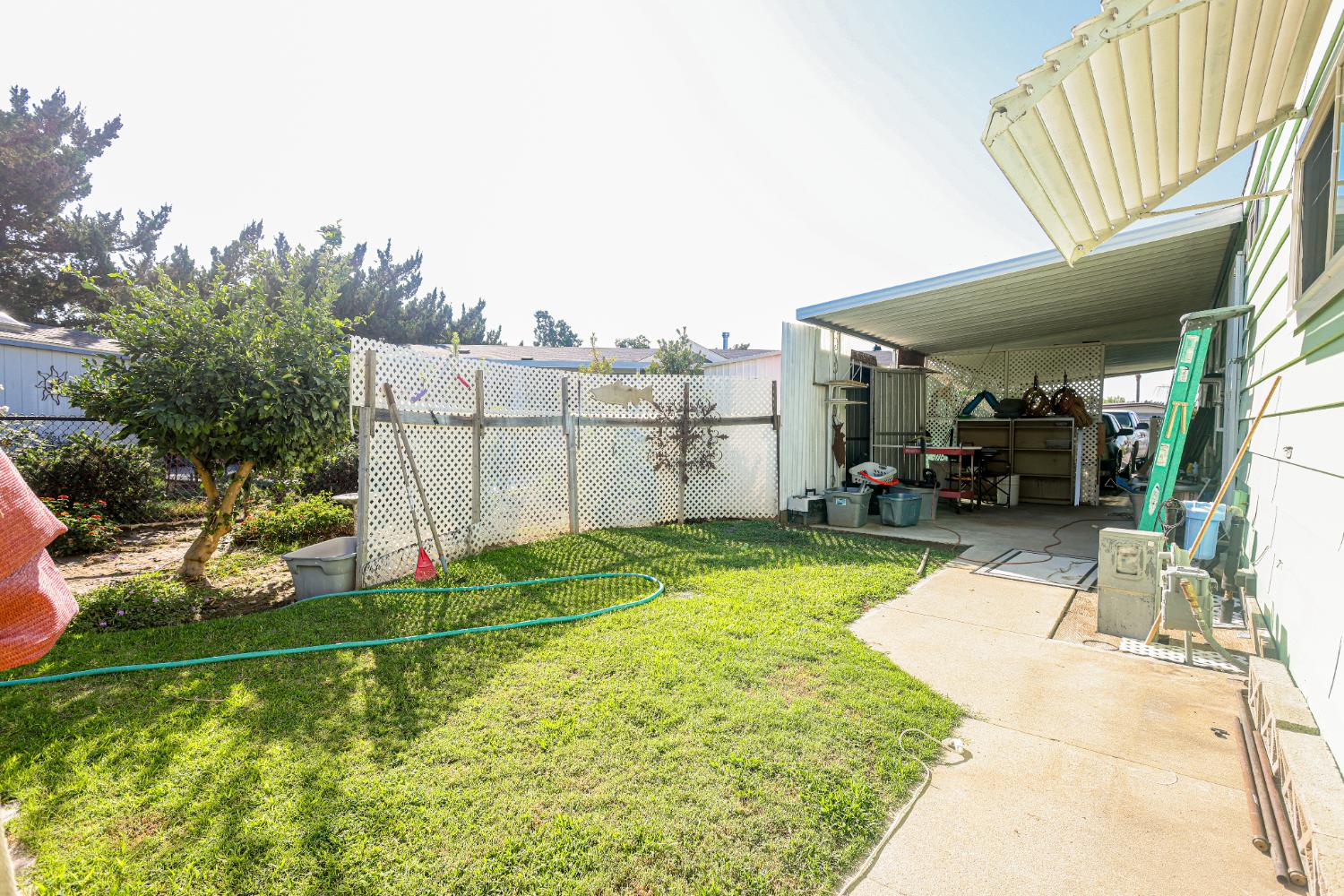1300 West Olson Avenue, Unit 61 Reedley, CA 93654 - Photo 20 of 20 a view of a backyard