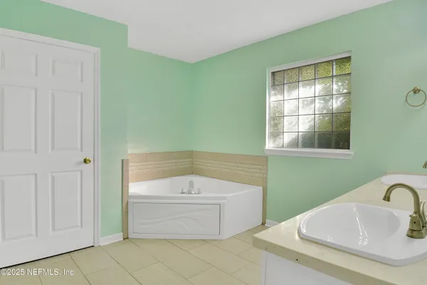 a bathroom with a sink and a bathtub