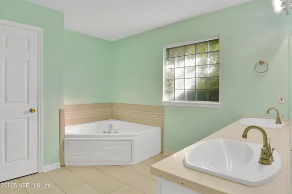 a bathroom with a sink and a bathtub