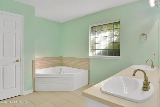 a bathroom with a sink and a bathtub