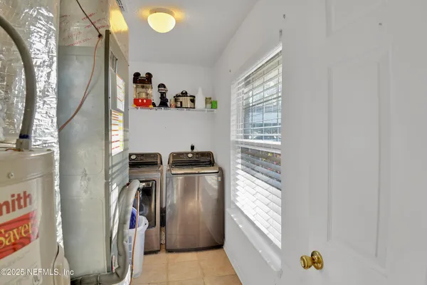 a view of a livingroom with storage and utility