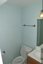 a bathroom with a toilet and a sink