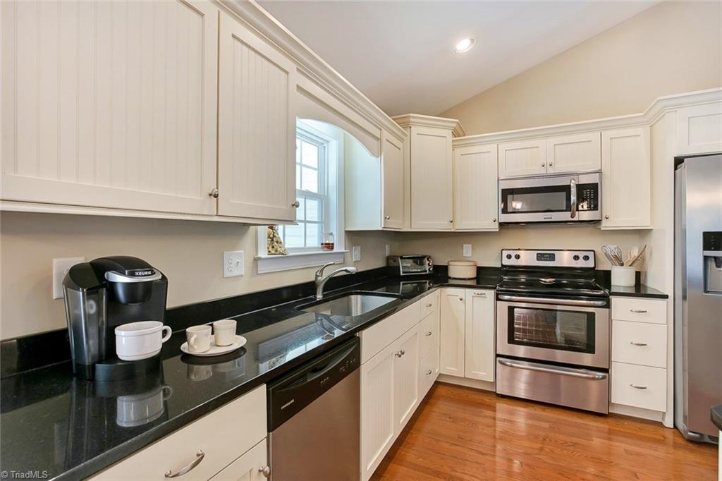 116 Laurel Ridge Court Reidsville, NC 27320 - Photo 8 of 30 Kitchen with Black Granite Counters