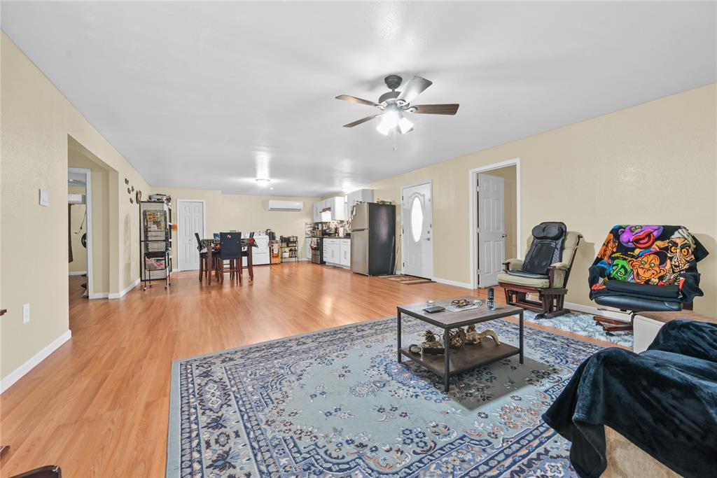 447 Masthead Road Gun Barrel City, TX 75156 - Photo 16 of 27 a living room with furniture and a flat screen tv