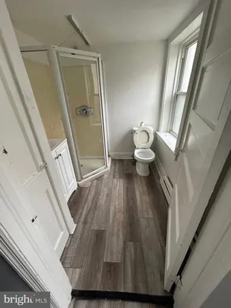 a bathroom with a sink and toilet