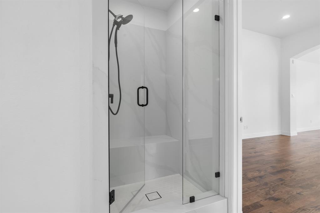 1013 Siena Drive Southlake, TX 76092 - Photo 17 of 31 a bathroom with a shower