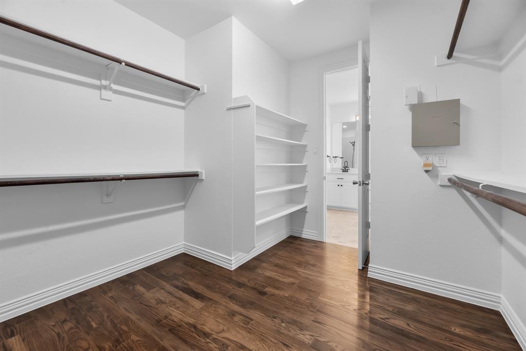 1013 Siena Drive Southlake, TX 76092 - Photo 18 of 31 a view of walk in closet with empty racks