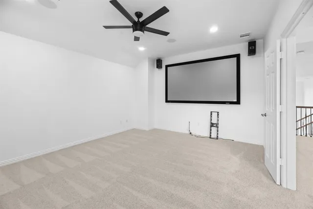 a living room with a flat screen tv