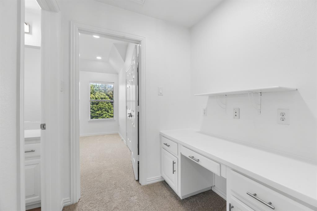 1013 Siena Drive Southlake, TX 76092 - Photo 26 of 31 a room with white cabinets and a sink