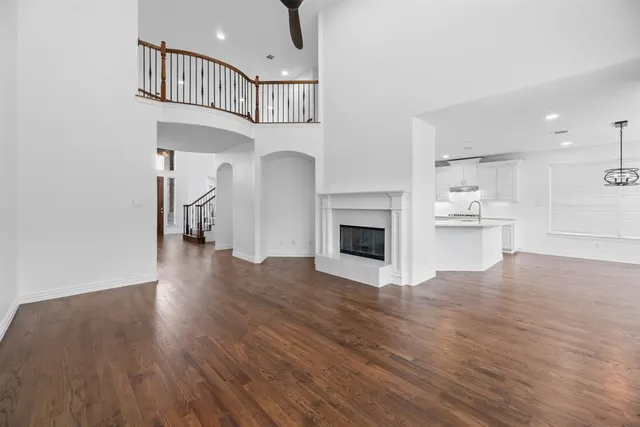 a view of kitchen with furniture and wooden floor
