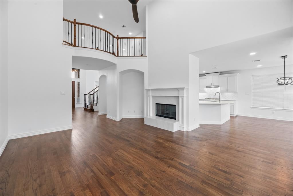 1013 Siena Drive Southlake, TX 76092 - Photo 7 of 31 a view of kitchen with furniture and wooden floor