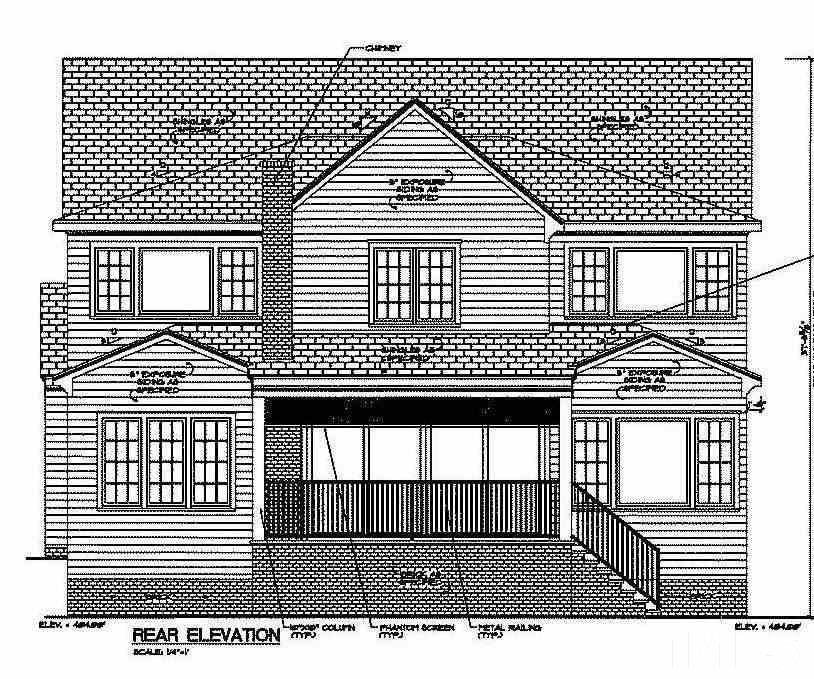 622 Shelley Road Raleigh, NC 27609 - Photo 3 of 26 a view of a brick house with many windows