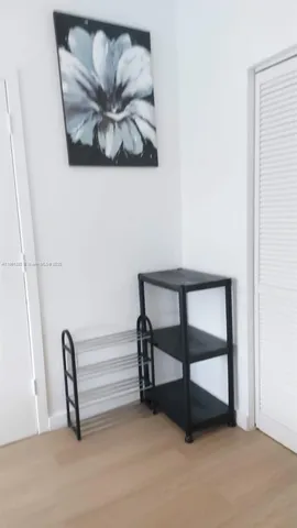 a view of painting with wooden floor