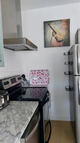 a bed room with a bed and a table