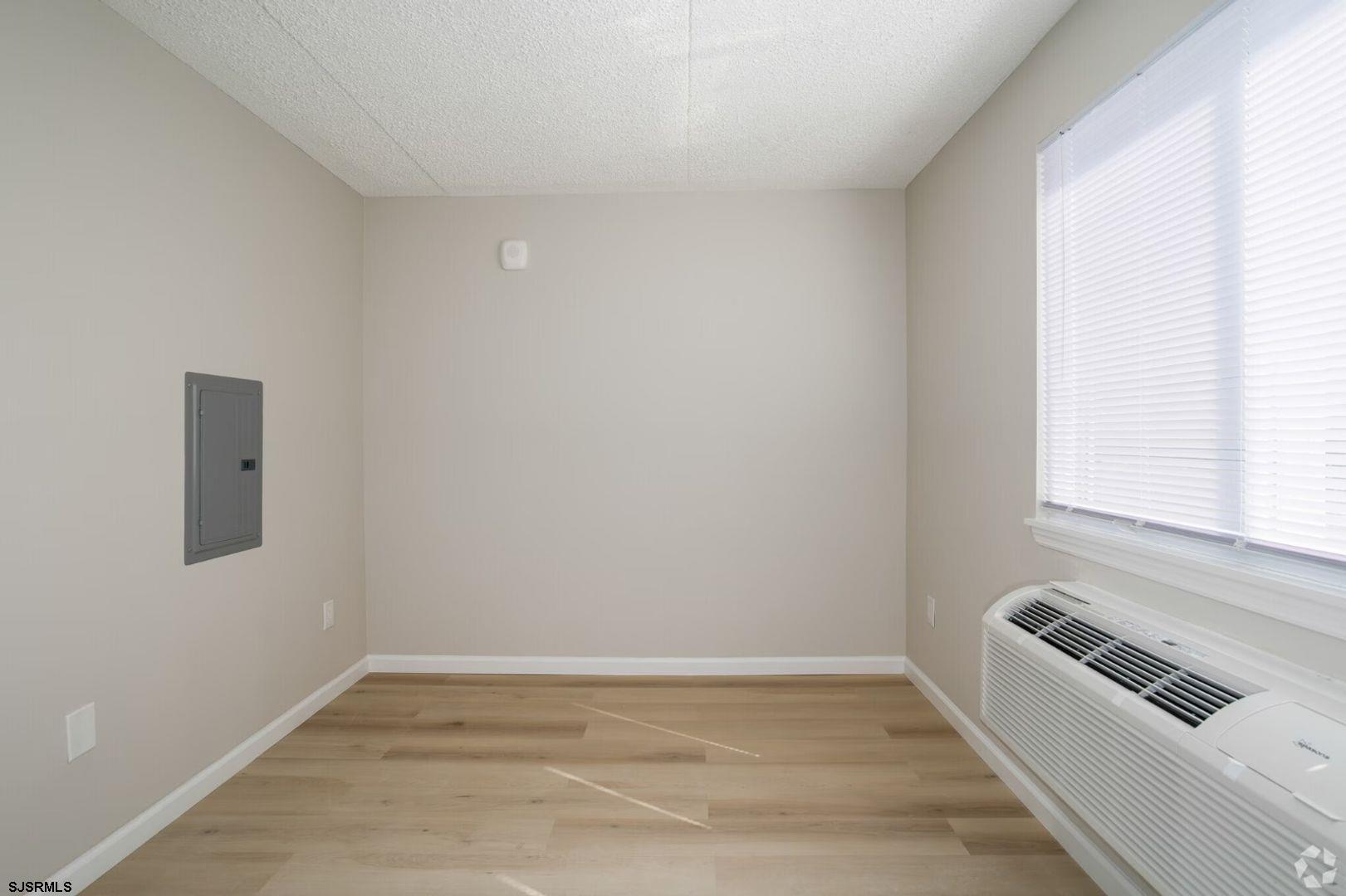 2580 Tilton Road, Unit 34 Egg Harbor Township, NJ 08234 - Photo 12 of 12 a view of an empty room with a window