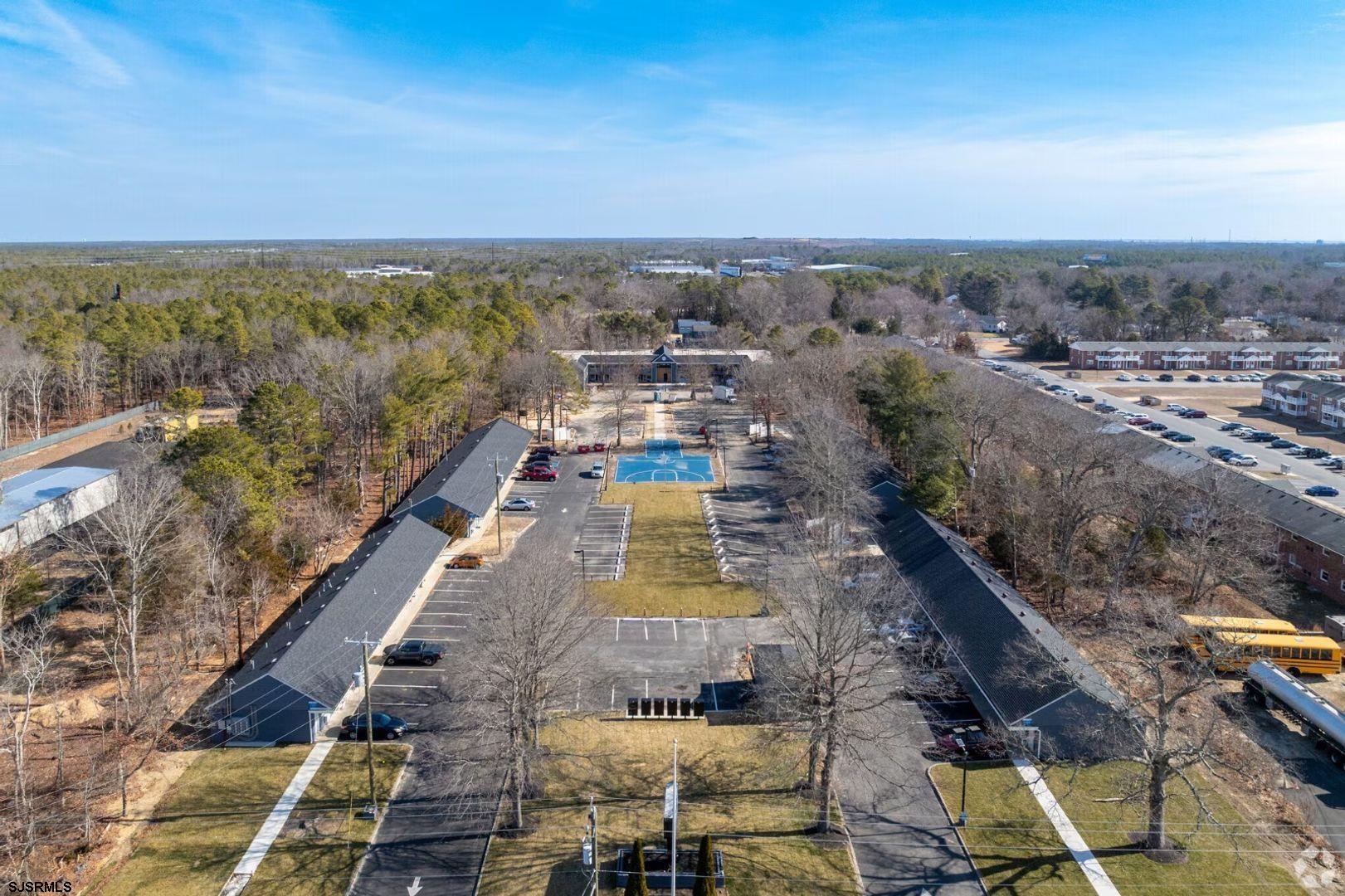 2580 Tilton Road, Unit 34 Egg Harbor Township, NJ 08234 - Photo 5 of 12 an aerial view of residential houses with outdoor space