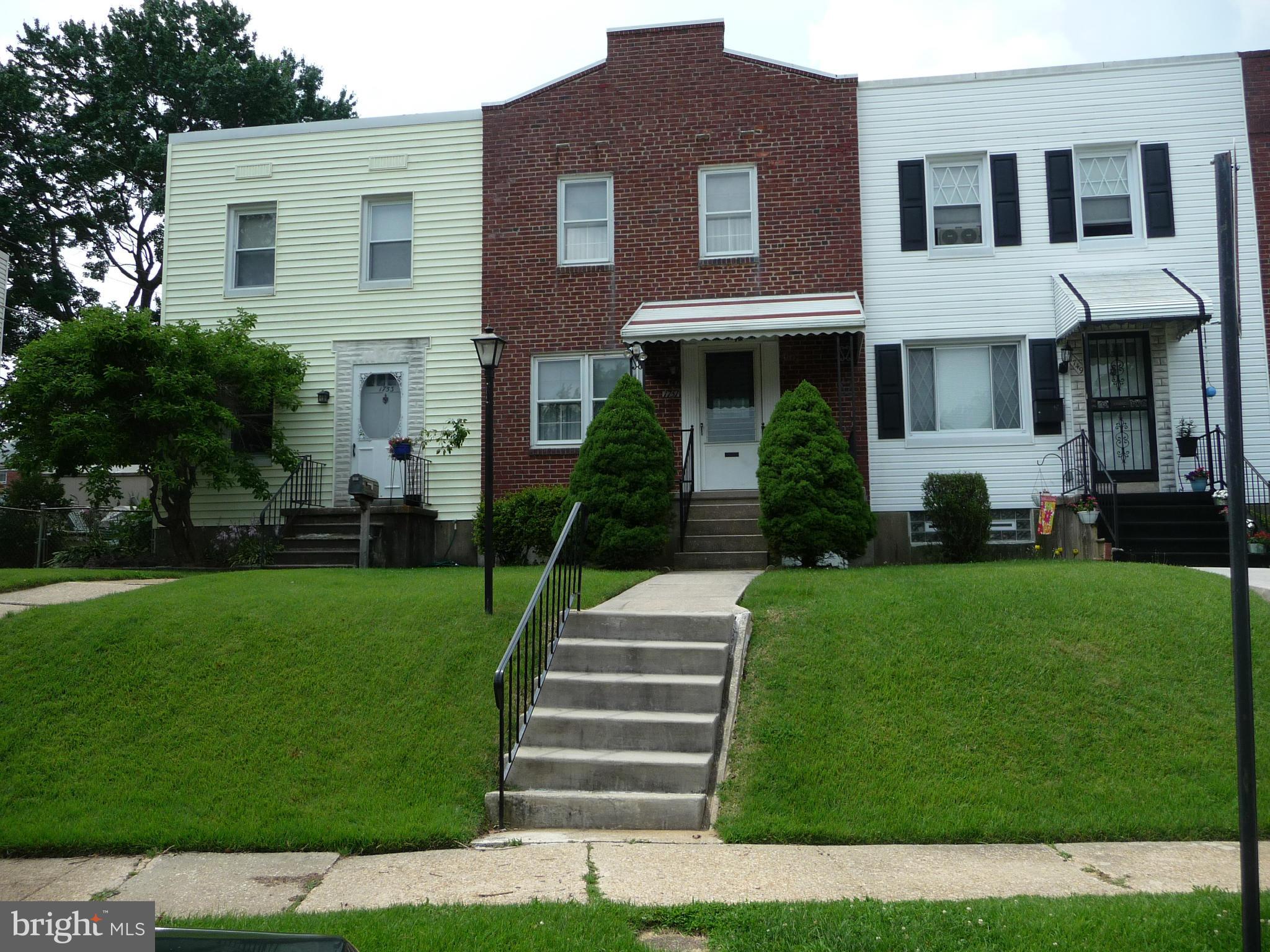 1751 Amuskai Road Baltimore, MD 21234 - Photo 1 of 27 a front view of a house with a yard