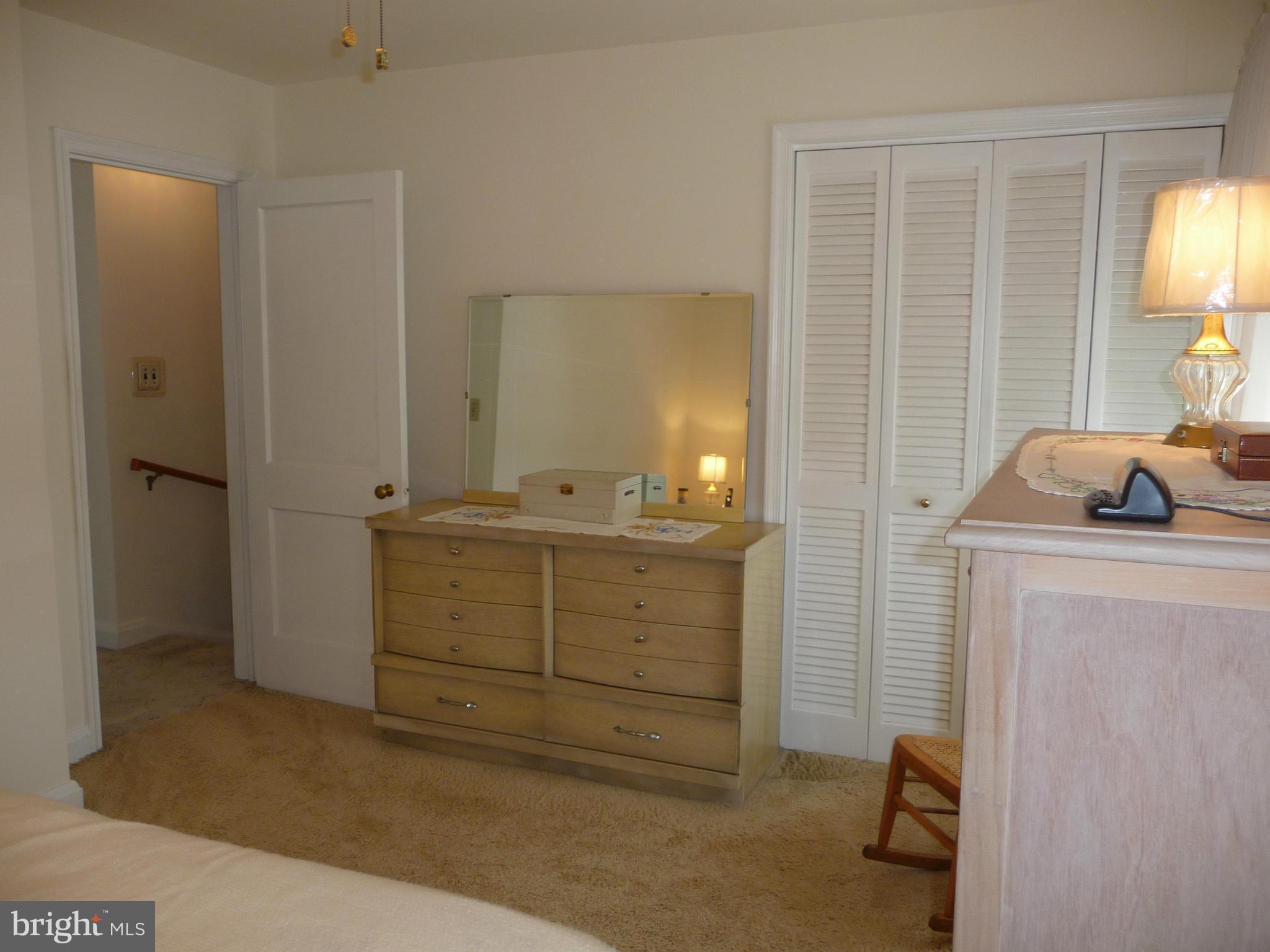 1751 Amuskai Road Baltimore, MD 21234 - Photo 12 of 27 a room with a bed and a mirror