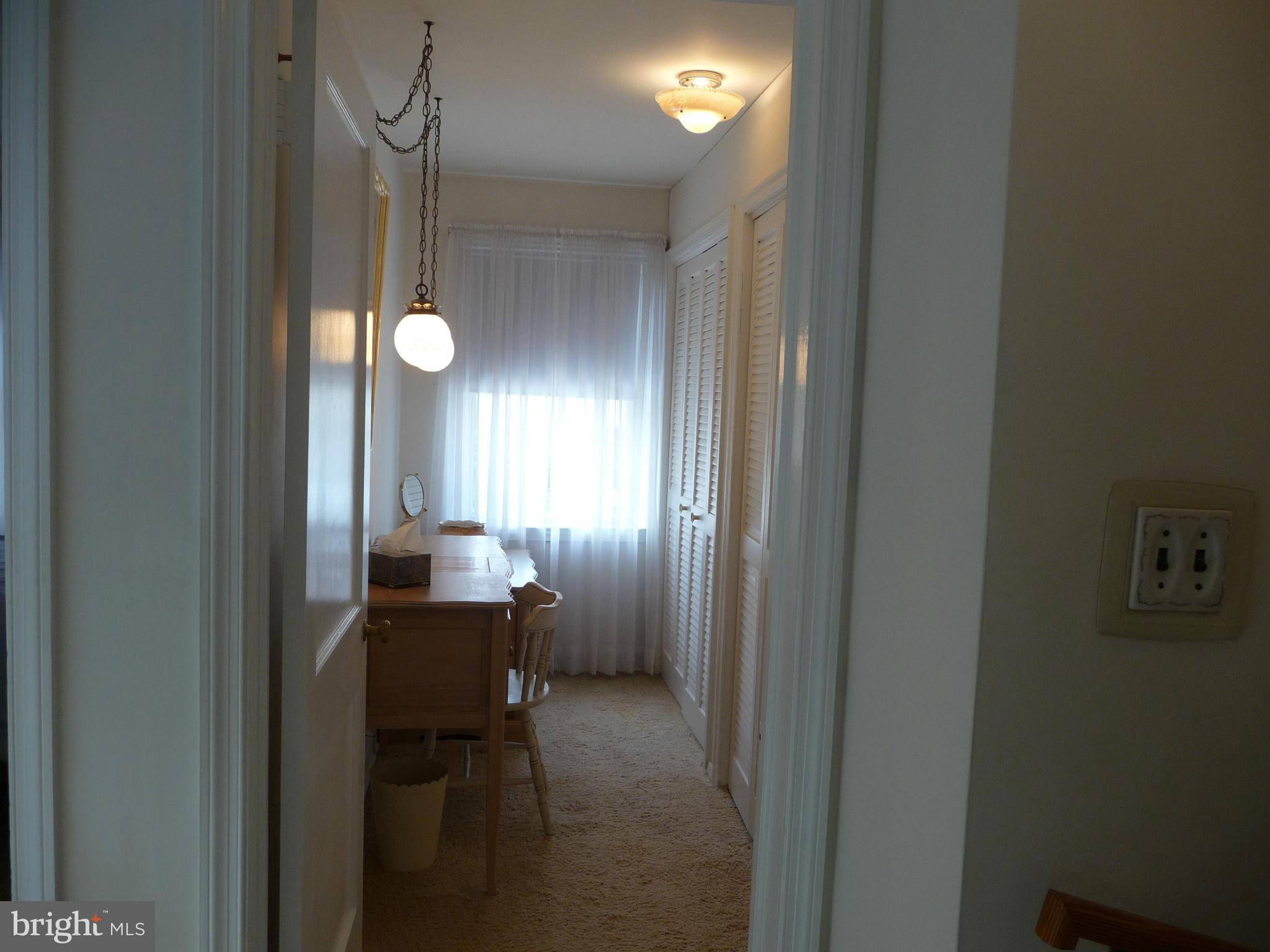 1751 Amuskai Road Baltimore, MD 21234 - Photo 16 of 27 a view of a dining room with furniture and chandelier fan