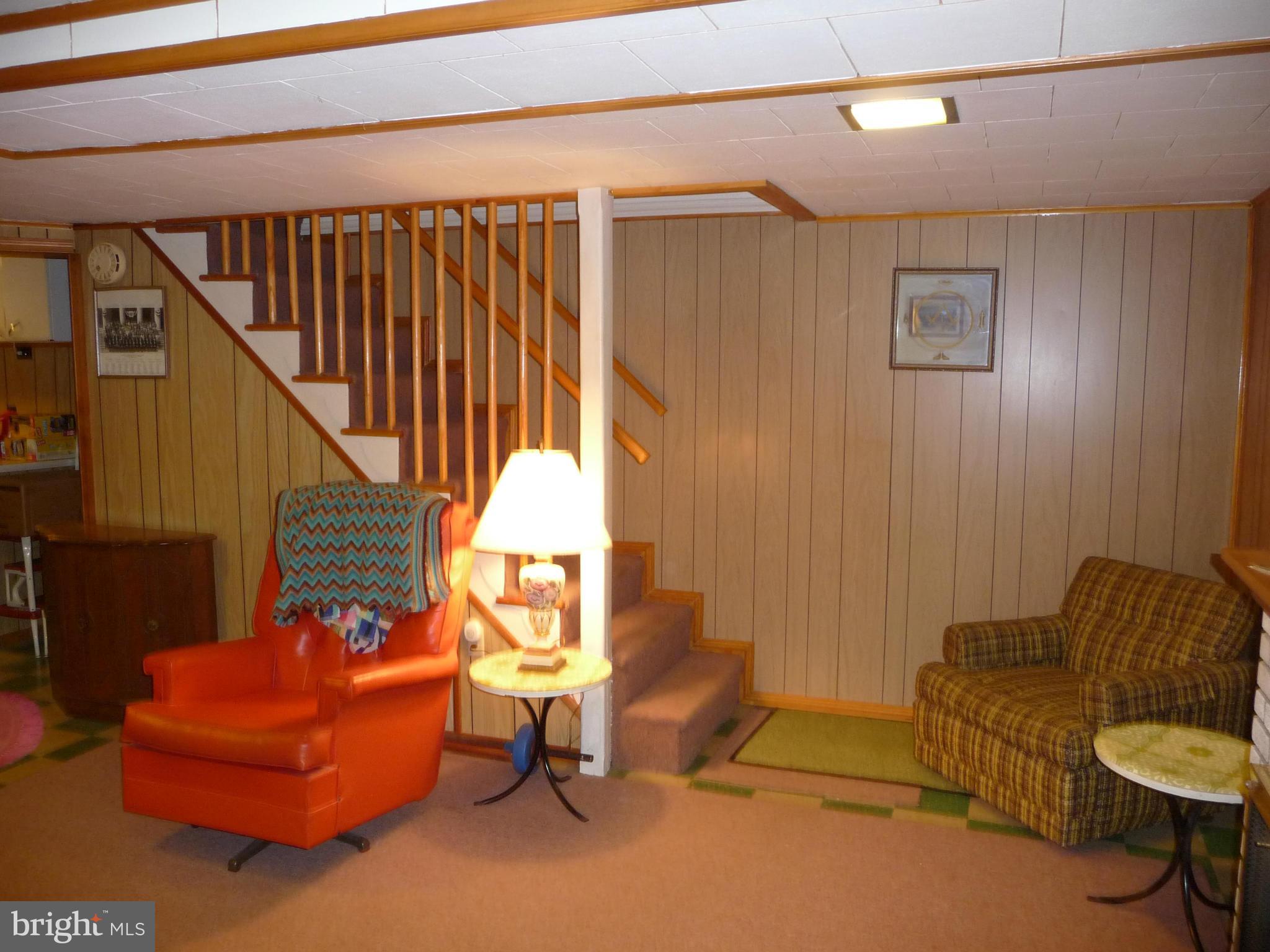 1751 Amuskai Road Baltimore, MD 21234 - Photo 21 of 27 a living room with furniture and a wooden floor