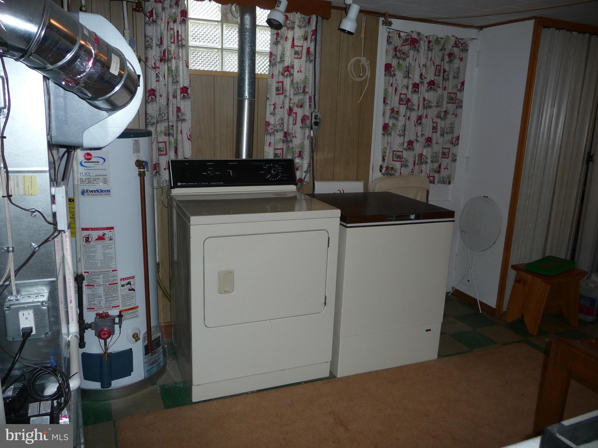 1751 Amuskai Road Baltimore, MD 21234 - Photo 23 of 27 a utility room with dryer and washer
