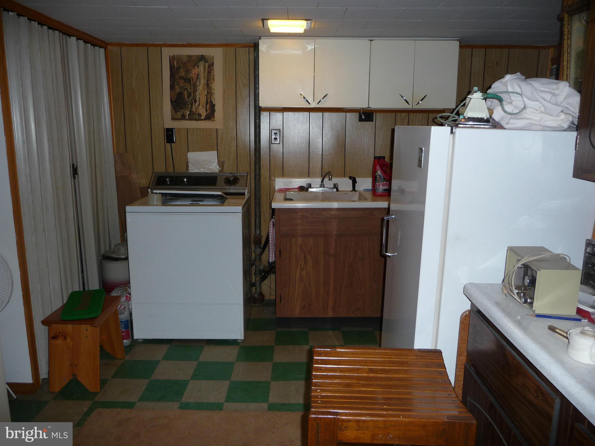 1751 Amuskai Road Baltimore, MD 21234 - Photo 24 of 27 a kitchen with stainless steel appliances a refrigerator and a stove