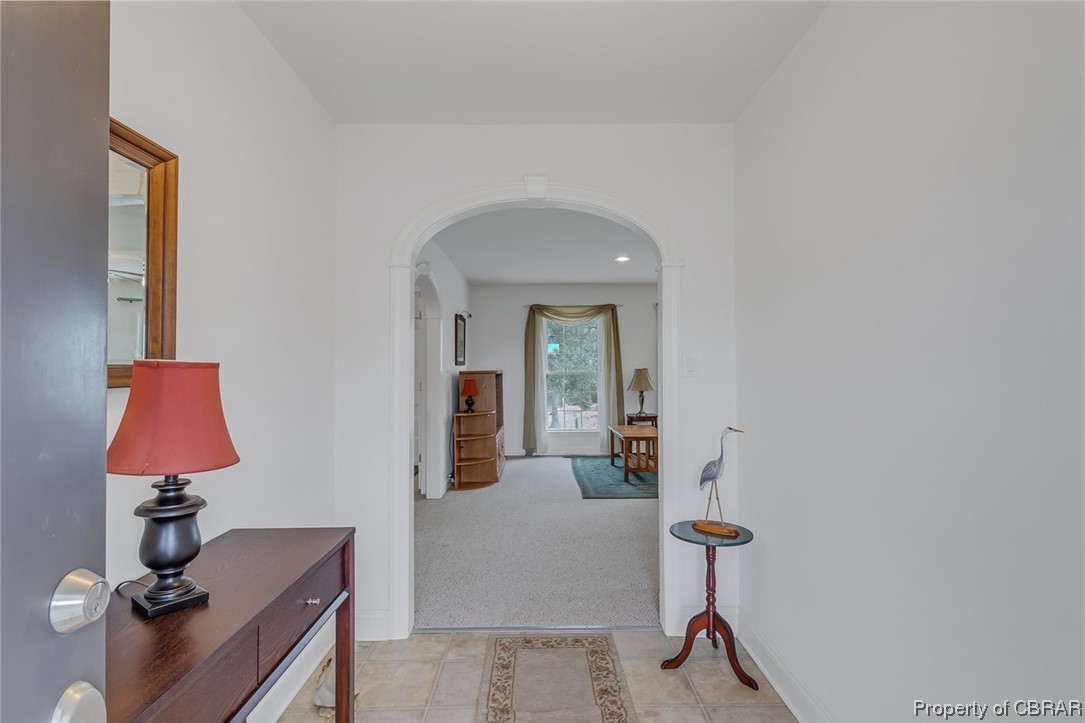1243 Fox Point Road Reedville, VA 22539 - Photo 26 of 44 Hallway with light colored carpet