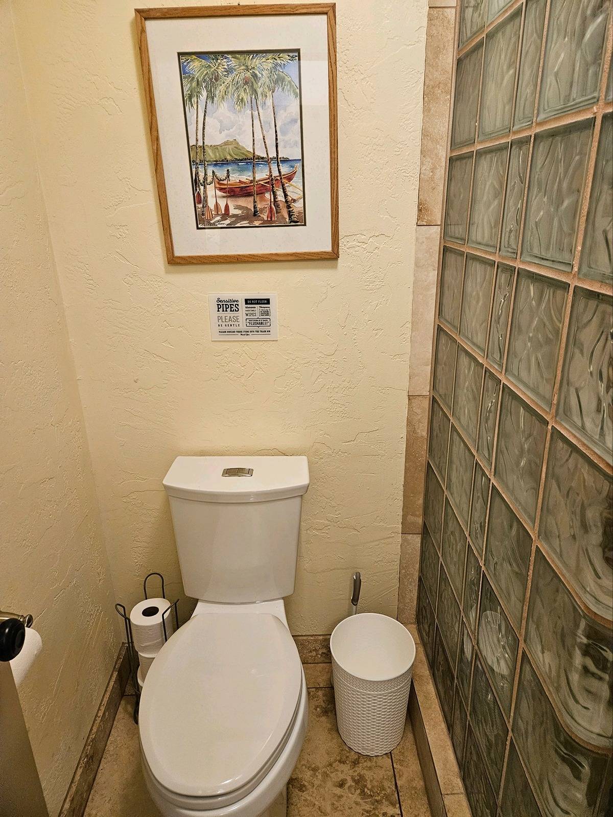 525 Aleka Loop, Unit K3 Kapaa, HI 96746 - Photo 10 of 14 a white toilet sitting next to a small bathroom
