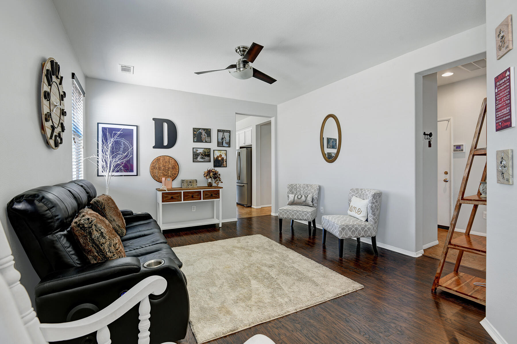 37232 Melbourne Street Indio, CA 92203 - Photo 1 of 30 a living room with furniture and wooden floor