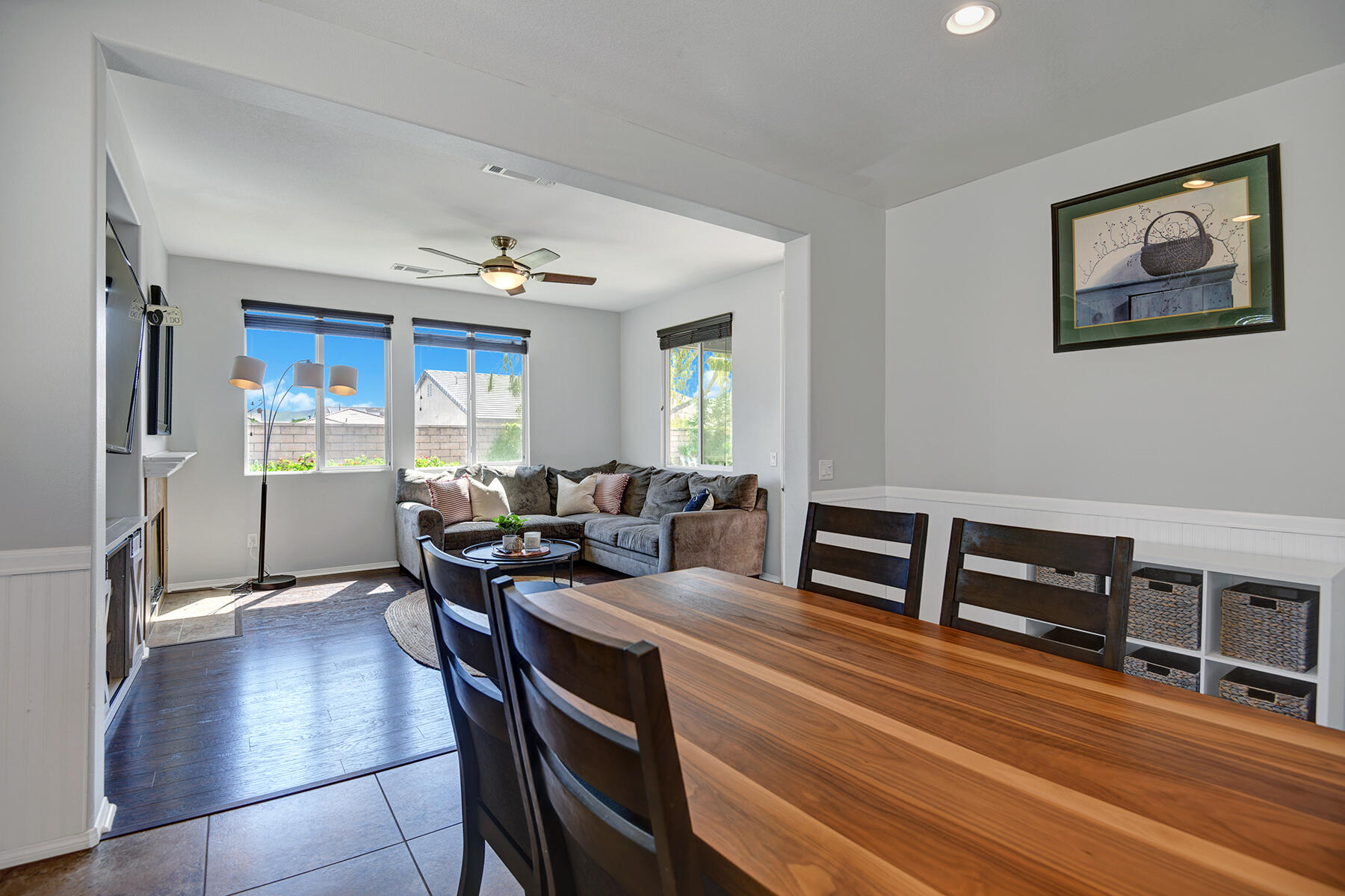 37232 Melbourne Street Indio, CA 92203 - Photo 13 of 30 a living room with furniture a window and wooden floor