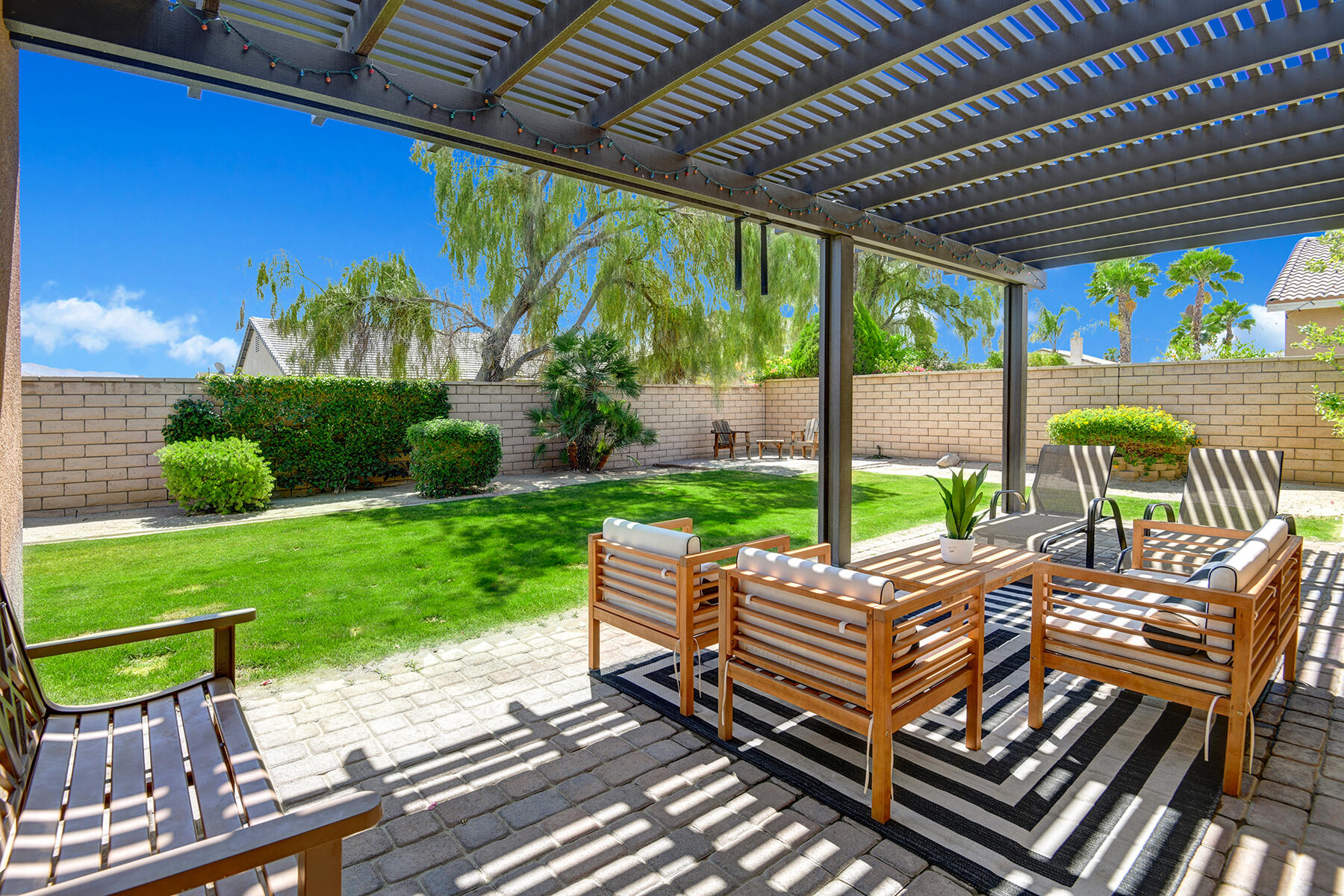 37232 Melbourne Street Indio, CA 92203 - Photo 25 of 30 a garden view with a seating space