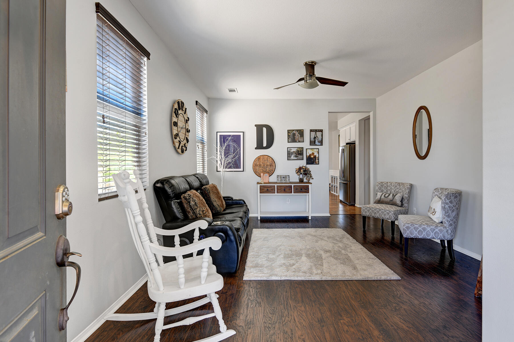 37232 Melbourne Street Indio, CA 92203 - Photo 3 of 30 a living room with furniture and a flat screen tv