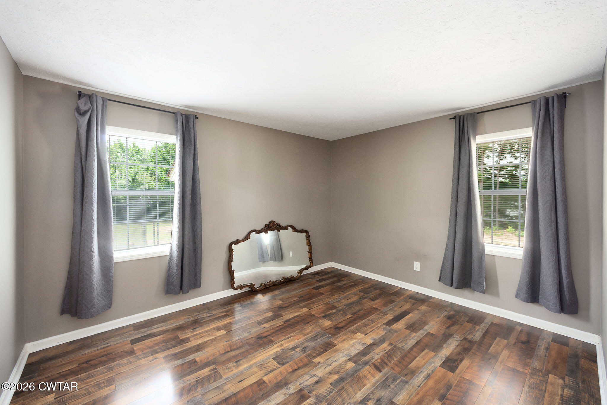 306 Jim Jackson Road Humboldt, TN 38343 - Photo 23 of 29 a bedroom with a bed and a window