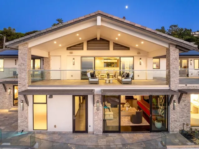 a outdoor living space with furniture and a potted plant