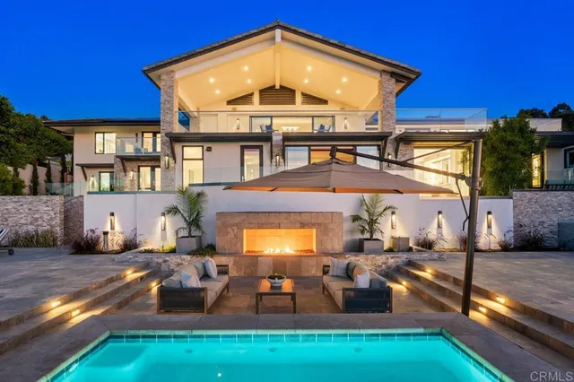 a kitchen with stainless steel appliances kitchen island granite countertop a sink and cabinets