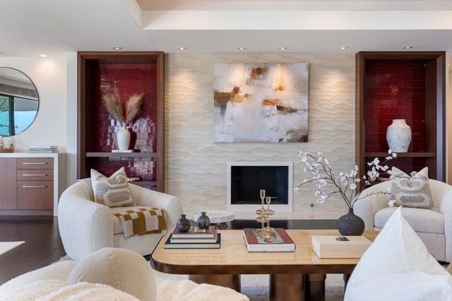 a view of a livingroom with furniture and window