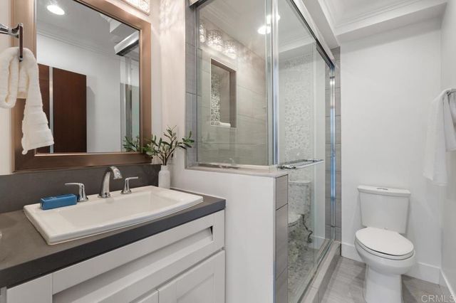 a bathroom with a shower and a tub