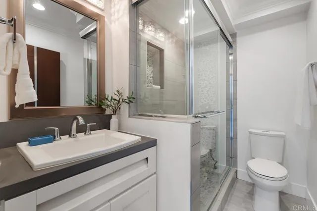 a bathroom with a shower and a tub