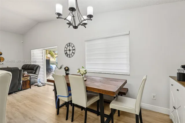 a view of a dining room with furniture