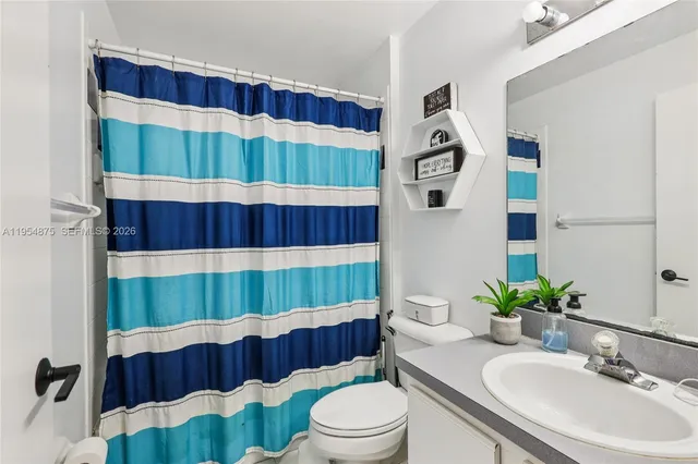 a playing room with furniture and a couch