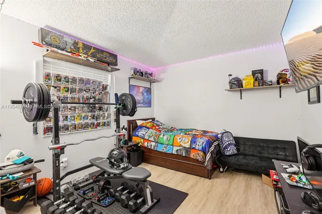 a bed room with a bed and toys