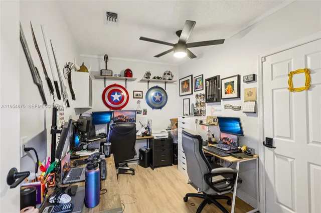 a view of a house with backyard and porch
