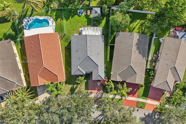 an aerial view of a city with lots of residential buildings