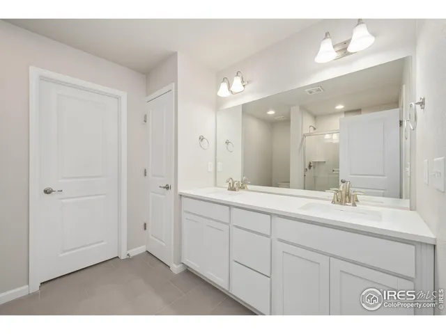 $370,000 | 2581 Stage Coach Drive, Unit D, Milliken, CO 80543