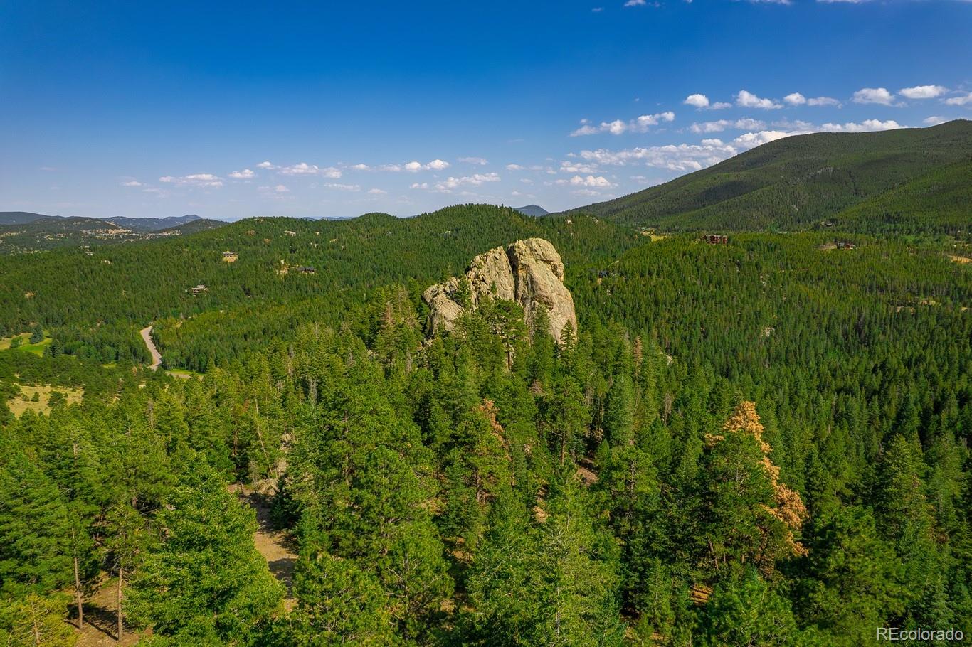 a sunset view with swimming pool