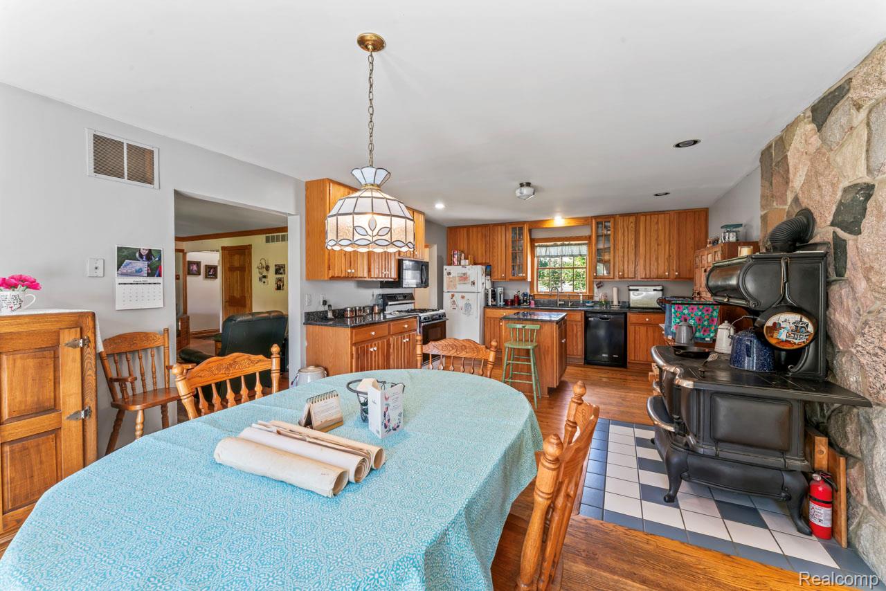 1591 Baldwin Road Lapeer, MI 48446 - Photo 7 of 46 Dining area with light wood-type flooring