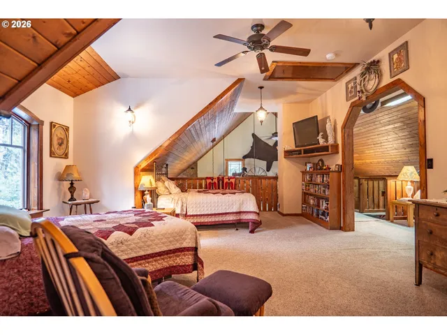 a bathroom with a sink a mirror and a window