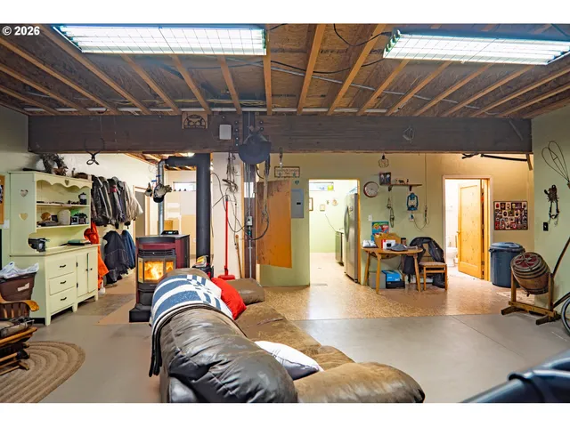 a kitchen with stainless steel appliances granite countertop a stove and cabinets